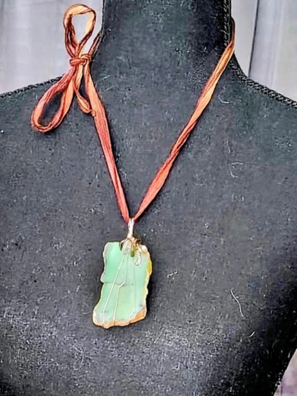Green Stone Wire-Wrapped Pendant Necklace With Brown Ribbon